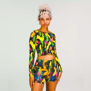 Lululemon Wunder Train Cropped Long Sleeve Shirt size 12. Undertone black multi